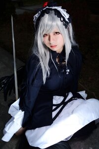 Rating: Safe Score: 0 Tags: 1girl dress frills gothic_lolita hairband lips lolita_fashion long_hair long_sleeves red_eyes solo suigintou sword weapon User: admin