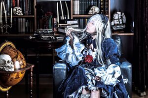 Rating: Safe Score: 0 Tags: 1girl cat dress flower frills gothic_lolita indoors lolita_fashion long_hair red_flower red_rose rose sitting skull solo suigintou white_hair window User: admin