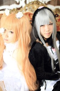 Rating: Safe Score: 0 Tags: 2girls bangs blonde_hair blunt_bangs blurry depth_of_field dress lips long_hair long_sleeves looking_at_viewer multiple_cosplay multiple_girls photo red_eyes silver_hair sisters smile suigintou tagme User: admin