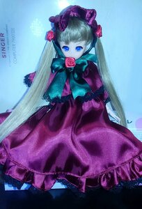 Rating: Safe Score: 0 Tags: 1girl blue_background blue_eyes bow doll dress flower long_hair pink_rose purple_dress purple_rose red_flower red_rose rose shinku solo very_long_hair User: admin