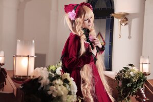 Rating: Safe Score: 0 Tags: 1girl blonde_hair blurry bonnet bow candle closed_eyes dress flower indoors instrument long_hair red_dress shinku sitting solo table User: admin