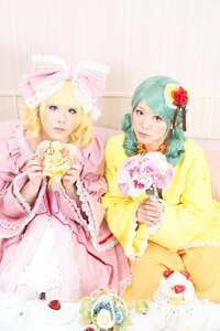 Rating: Safe Score: 0 Tags: 2girls blonde_hair blue_eyes bow cake dress flower food frills fruit hina_ichigo multiple_cosplay multiple_girls pastry pink_bow pink_dress rose strawberry tagme yellow_dress User: admin