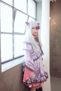Rating: Safe Score: 0 Tags: 1girl barasuishou dress flower frills hair_flower hair_ornament indoors lolita_fashion long_hair solo window User: admin
