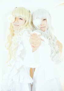 Rating: Safe Score: 0 Tags: 2girls bangs blonde_hair blunt_bangs dress eyepatch frills kirakishou lips long_hair multiple_girls siblings sisters smile solo striped twins yellow_eyes User: admin