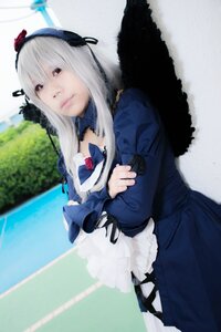 Rating: Safe Score: 0 Tags: 1girl auto_tagged dress flower frills hairband lips long_hair long_sleeves red_eyes ribbon silver_hair solo suigintou User: admin