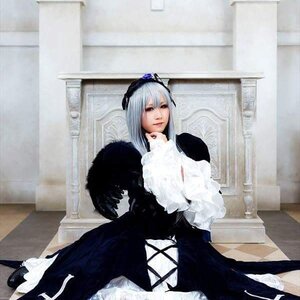 Rating: Safe Score: 0 Tags: 1girl black_dress building dress gothic_lolita long_hair long_sleeves looking_at_viewer silver_hair solo standing suigintou User: admin