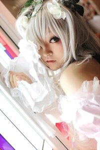 Rating: Safe Score: 0 Tags: 1girl bare_shoulders blurry book depth_of_field dress hair_ornament hair_over_one_eye kirakishou lips solo wedding_dress User: admin