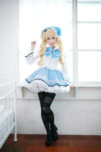 Rating: Safe Score: 0 Tags: 1girl blonde_hair blue_eyes bow dress full_body long_hair pantyhose shinku solo striped striped_legwear User: admin