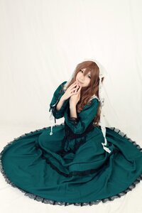 Rating: Safe Score: 0 Tags: 1girl blue_eyes brown_hair dress frills green_dress lips long_dress long_hair long_sleeves looking_at_viewer sitting smile solo suiseiseki User: admin