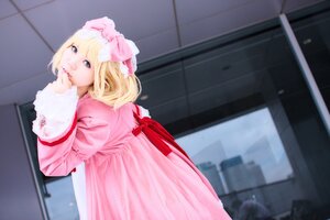 Rating: Safe Score: 0 Tags: 1girl blonde_hair blue_eyes blurry bow depth_of_field door dress hinaichigo indoors long_sleeves looking_at_viewer pink_dress solo User: admin