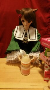Rating: Safe Score: 0 Tags: 1girl animal_ears black_eyes brown_hair cat_ears coffee cup doll frills long_hair long_sleeves sitting solo suiseiseki User: admin