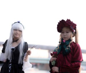 Rating: Safe Score: 0 Tags: 2girls blonde_hair bonnet dress flower lips long_hair long_sleeves multiple_cosplay multiple_girls pipe realistic shinku silver_hair suigintou tagme User: admin