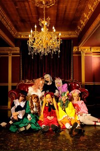Rating: Safe Score: 0 Tags: 6+girls blonde_hair blue_hair bow brown_hair closed_eyes dress flower green_hair hair_ornament hat long_hair multiple_boys multiple_cosplay multiple_girls pink_dress red_hair ribbon short_hair sitting tagme twintails ushiromiya_battler User: admin