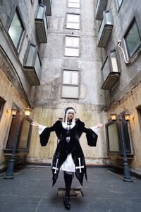 Rating: Safe Score: 0 Tags: 1girl indoors maid_headdress outstretched_arms solo standing suigintou User: admin