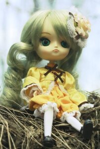 Rating: Safe Score: 0 Tags: 1girl blonde_hair doll dress flower frills green_eyes kanaria long_sleeves ribbon sitting solo white_legwear yellow_dress User: admin