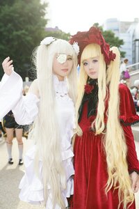 Rating: Safe Score: 0 Tags: 2girls blonde_hair blurry blurry_background depth_of_field dress drill_hair eyepatch flower lips long_hair multiple_cosplay multiple_girls photo rose shinku standing tagme very_long_hair white_legwear User: admin