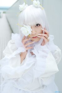 Rating: Safe Score: 0 Tags: 1girl artist_name blurry depth_of_field flower kirakishou lips long_sleeves looking_at_viewer solo striped sweater vertical_stripes watermark white_flower white_hair User: admin