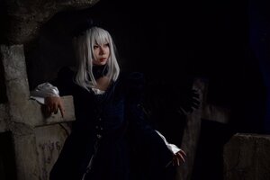 Rating: Safe Score: 0 Tags: 1girl book dark gloves lips long_hair long_sleeves paper realistic solo suigintou white_hair User: admin