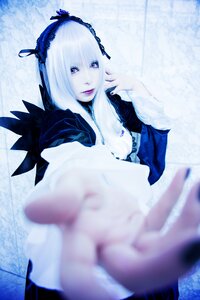 Rating: Safe Score: 0 Tags: 1girl blurry blurry_foreground depth_of_field dress frills hairband lips long_sleeves looking_at_viewer motion_blur pale_skin photo solo suigintou User: admin