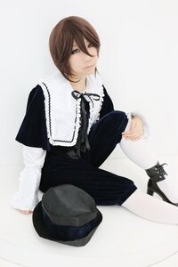 Rating: Safe Score: 0 Tags: 1girl black_cat black_ribbon brown_hair cat dress hat hat_removed headwear_removed lips lolita_fashion long_sleeves looking_at_viewer ribbon sitting solo souseiseki striped vertical_stripes User: admin