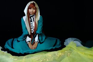 Rating: Safe Score: 0 Tags: 1girl black_background blue_dress brown_hair closed_mouth dress full_body green_dress long_hair long_sleeves looking_at_viewer own_hands_together red_eyes sitting smile solo suiseiseki User: admin