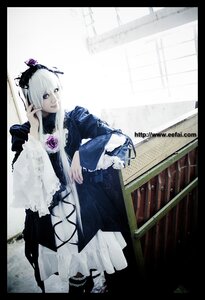 Rating: Safe Score: 0 Tags: 1girl black_border dress flower frills letterboxed long_hair long_sleeves pillarboxed rose silver_hair solo suigintou wide_sleeves windowboxed User: admin
