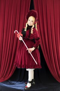 Rating: Safe Score: 0 Tags: 1girl blonde_hair blue_eyes bow curtains dress flower full_body holding long_hair long_sleeves looking_at_viewer red_dress ribbon shinku solo standing User: admin