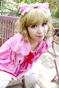 Rating: Safe Score: 0 Tags: 1girl blonde_hair blurry bow day dress fence frills hair_bow hinaichigo lips looking_at_viewer outdoors pink_dress railing ribbon short_hair solo User: admin