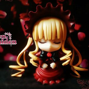 Rating: Safe Score: 0 Tags: 1girl artist_name blonde_hair bonnet chibi closed_eyes doll dress flower frills long_hair long_sleeves rose shinku sleeping solo teacup very_long_hair User: admin