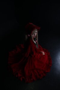 Rating: Safe Score: 0 Tags: 1girl black_background bonnet closed_eyes closed_mouth dark dress frills lolita_fashion long_hair long_sleeves red_dress shinku solo User: admin