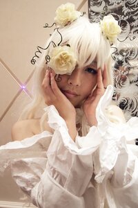 Rating: Safe Score: 0 Tags: 1girl blue_eyes crown dress flower hair_ornament hands hands_on_own_face kirakishou lips long_hair rose solo upper_body white_flower white_hair white_rose User: admin