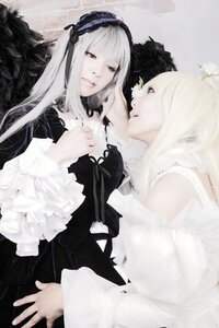 Rating: Safe Score: 0 Tags: 1girl black_dress dress flower frills gothic_lolita hairband lace lips lolita_fashion long_hair long_sleeves looking_at_viewer multiple_cosplay red_eyes ribbon suigintou tagme white_hair wings User: admin