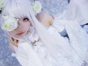 Rating: Safe Score: 0 Tags: 1girl bangs blunt_bangs blurry blurry_background blurry_foreground depth_of_field eyepatch flower hair_ornament kirakishou lips looking_at_viewer smile solo sweater white_flower white_hair white_rose User: admin