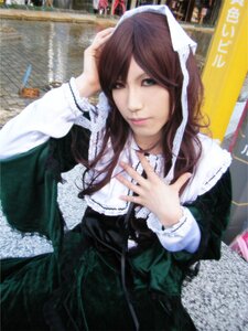 Rating: Safe Score: 0 Tags: 1girl black_dress brown_hair building city dress lips long_hair long_sleeves outdoors photo solo suiseiseki User: admin