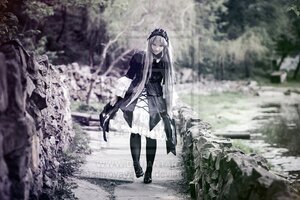 Rating: Safe Score: 0 Tags: 1girl auto_tagged black_footwear black_legwear blurry blurry_background blurry_foreground depth_of_field dress full_body long_hair outdoors snow solo standing suigintou very_long_hair white_hair User: admin