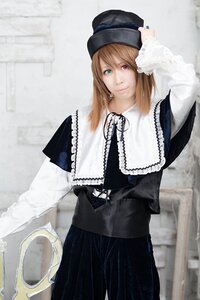 Rating: Safe Score: 0 Tags: 1girl 3d blurry brown_hair capelet depth_of_field hat heterochromia long_hair long_sleeves looking_at_viewer red_eyes smile solo souseiseki standing User: admin