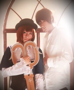 Rating: Safe Score: 0 Tags: 1boy 1girl brown_hair hat indoors long_sleeves maid realistic short_hair sitting window User: admin