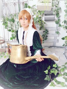Rating: Safe Score: 0 Tags: 1girl blonde_hair blue_eyes book flower long_hair long_sleeves plant red_eyes shirt sitting solo suiseiseki User: admin