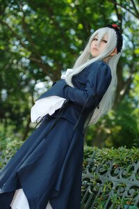 Rating: Safe Score: 0 Tags: 1girl blue_dress blurry blurry_background depth_of_field dress lips long_hair looking_at_viewer looking_back outdoors pantyhose solo standing suigintou User: admin