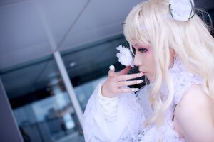 Rating: Safe Score: 0 Tags: 1girl auto_tagged blonde_hair blurry depth_of_field flower hair_flower hair_ornament kirakishou lips long_hair nail_polish profile solo sweater upper_body white_hair User: admin