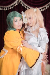 Rating: Safe Score: 0 Tags: 2girls blonde_hair curtains dress flower frills hair_flower hair_ornament lips long_hair long_sleeves looking_at_viewer multiple_cosplay multiple_girls smile tagme white_flower yellow_dress User: admin
