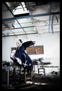 Rating: Safe Score: 0 Tags: 1girl bird black_border boots feathers hair_ornament letterboxed long_hair sitting snow solo suigintou window wings User: admin