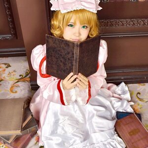 Rating: Safe Score: 0 Tags: 1girl blonde_hair book dress frills green_eyes hat hinaichigo indoors long_sleeves short_hair sitting smile solo tabard white_dress wide_sleeves yakumo_ran User: admin