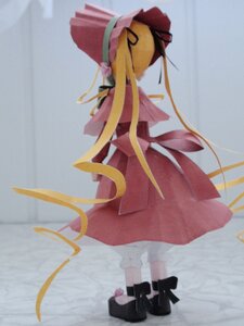 Rating: Safe Score: 0 Tags: 1girl blonde_hair doll hair_ribbon long_sleeves red_skirt ribbon shinku solo standing wide_sleeves User: admin