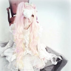 Rating: Safe Score: 0 Tags: 1girl animal_ears bangs blurry fox_ears kirakishou long_hair looking_at_viewer pink_hair sitting solo User: admin