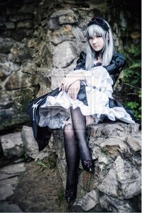 Rating: Safe Score: 0 Tags: 1girl black_legwear blurry dress frills hairband lolita_fashion long_hair long_sleeves red_eyes sitting solo suigintou thighhighs User: admin