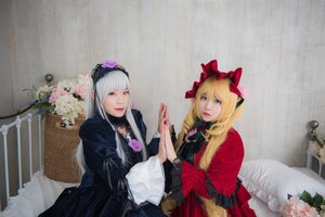 Rating: Safe Score: 0 Tags: 2girls bangs blonde_hair blue_eyes curtains dress flower frills holding_hands indoors lips lolita_fashion long_hair long_sleeves looking_at_viewer multiple_cosplay multiple_girls sitting tagme User: admin