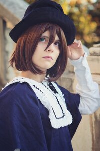 Rating: Safe Score: 0 Tags: 1girl black_headwear blue_dress blurry blurry_background brown_hair closed_mouth depth_of_field dress green_eyes hair_between_eyes hat lips long_sleeves looking_at_viewer outdoors short_hair solo souseiseki upper_body User: admin