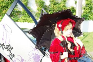 Rating: Safe Score: 0 Tags: 1girl blonde_hair blue_eyes bonnet bush day flower outdoors parasol red_dress rose shinku solo teacup tree umbrella User: admin