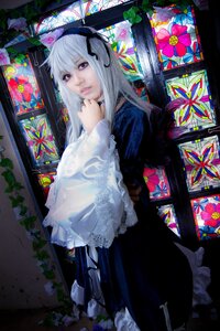 Rating: Safe Score: 0 Tags: 1girl flower frilled_sleeves frills hairband lips long_hair looking_at_viewer ribbon silver_hair solo suigintou User: admin